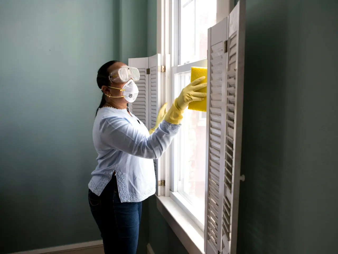 Home inspector assessing a residential property exterior